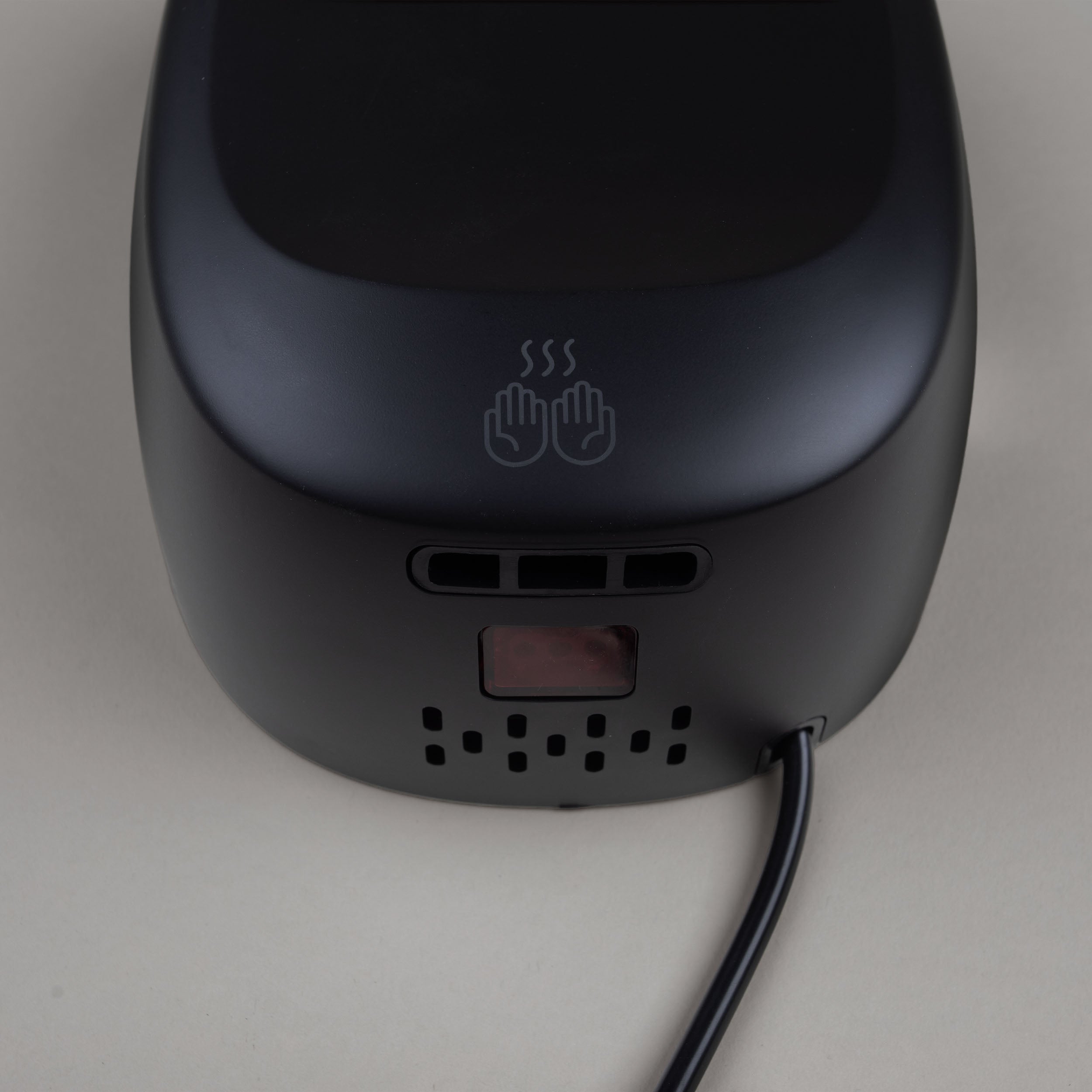 Touchless electric hand dryer